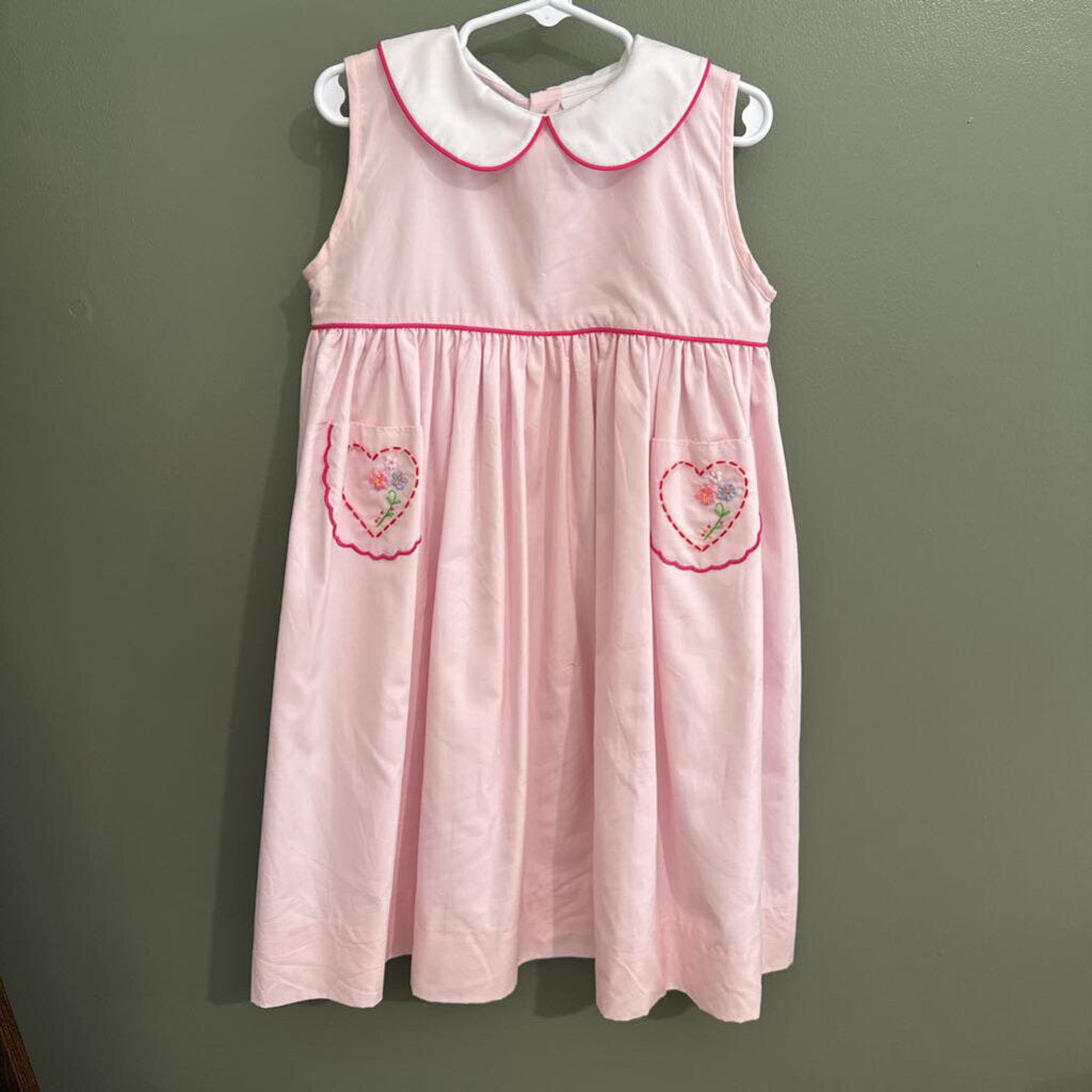 pink smock dress with heart pockets