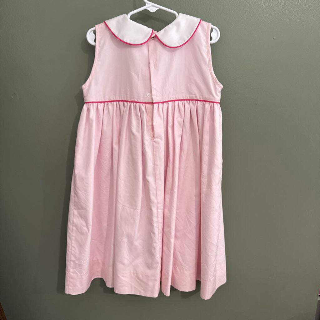 pink smock dress with heart pockets