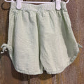 green shorts