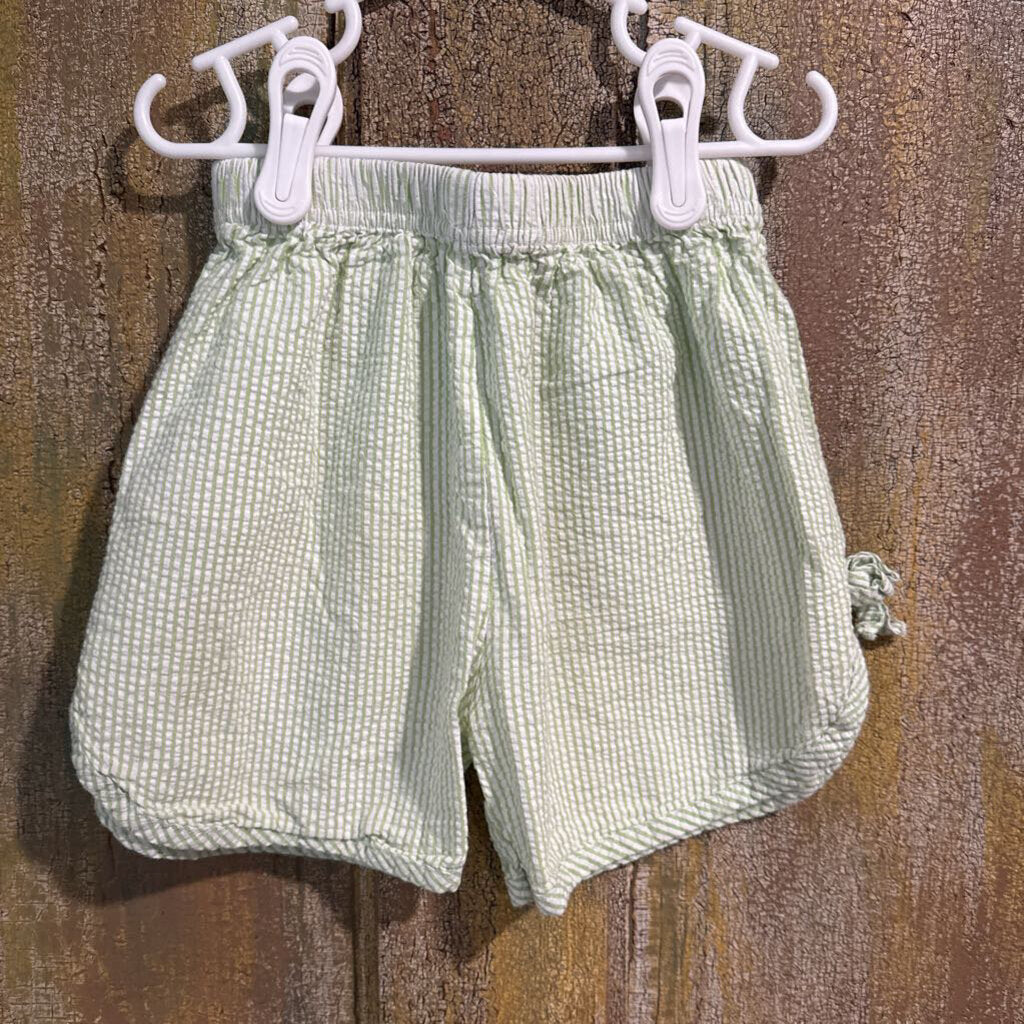 green shorts